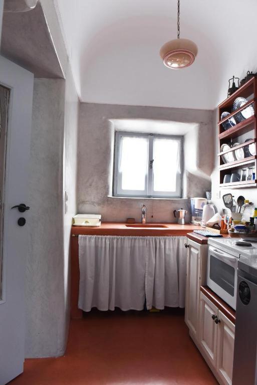 Calderimi Traditional Houses Тира Экстерьер фото